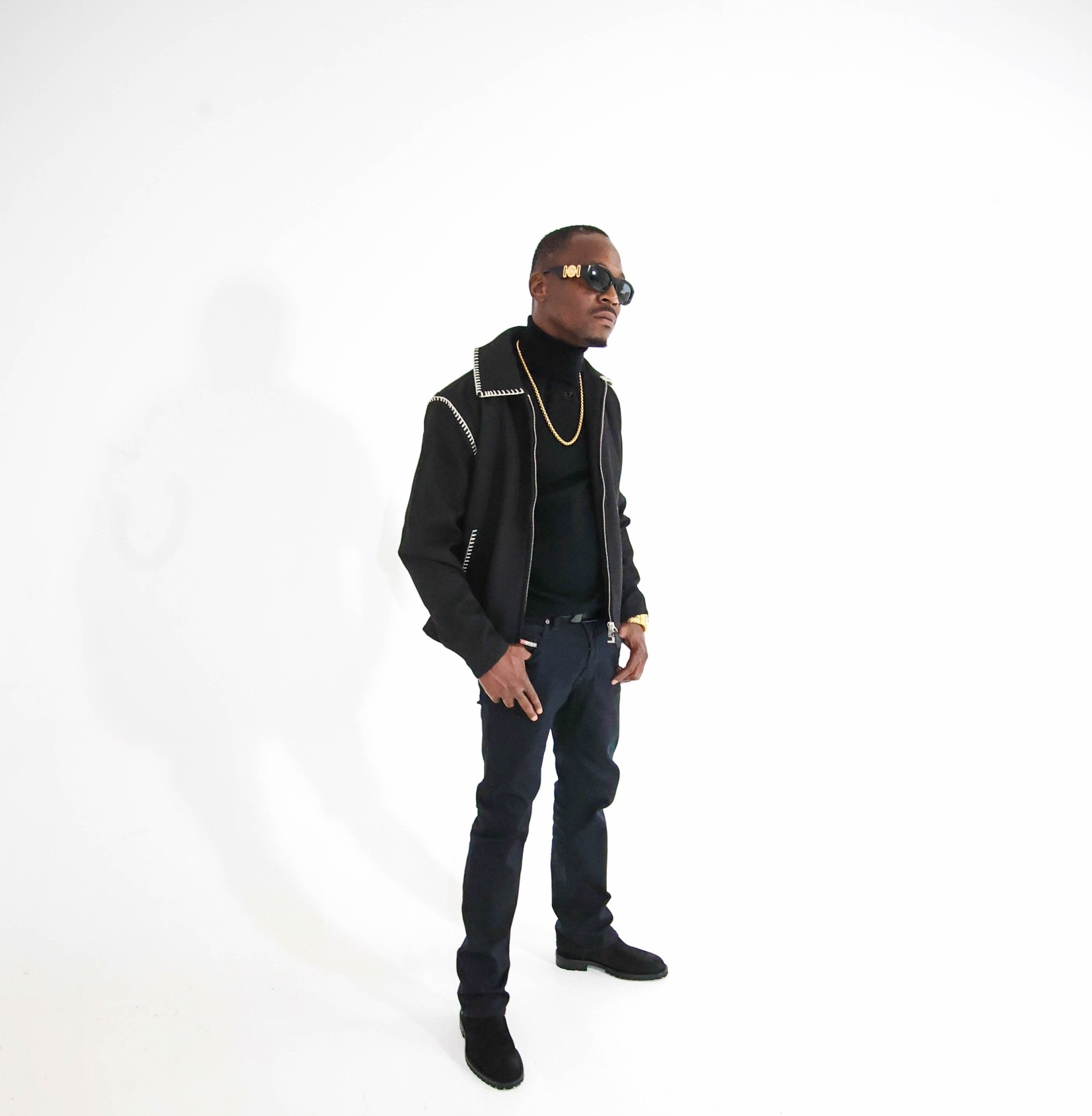 El Presi standing full-length portrait